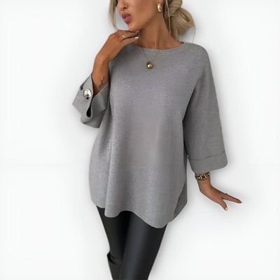 LEAH – OVERSIZED TRUI MET KNOPEN OP DE MANCHET