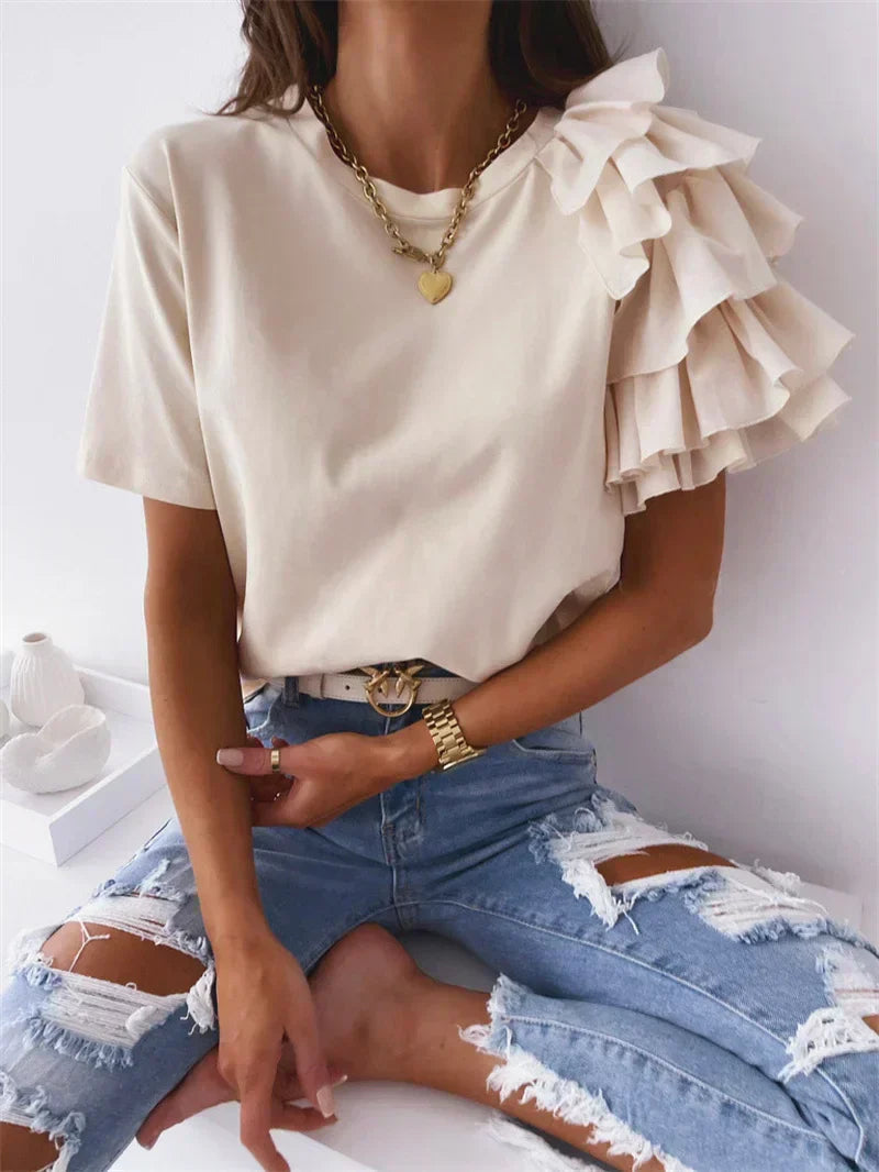 Anna™ | Trendy top met statement rufflemouw