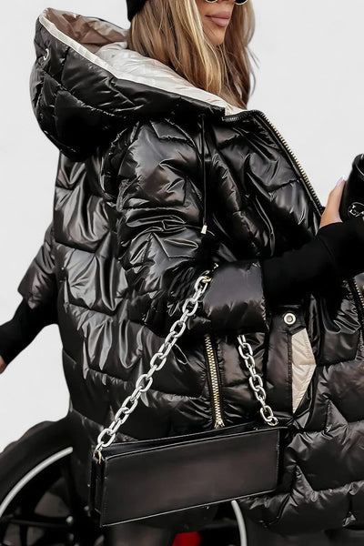 FRANCINE – GEZELLIGE GEWATTEERDE JAS MET CAPUCHON